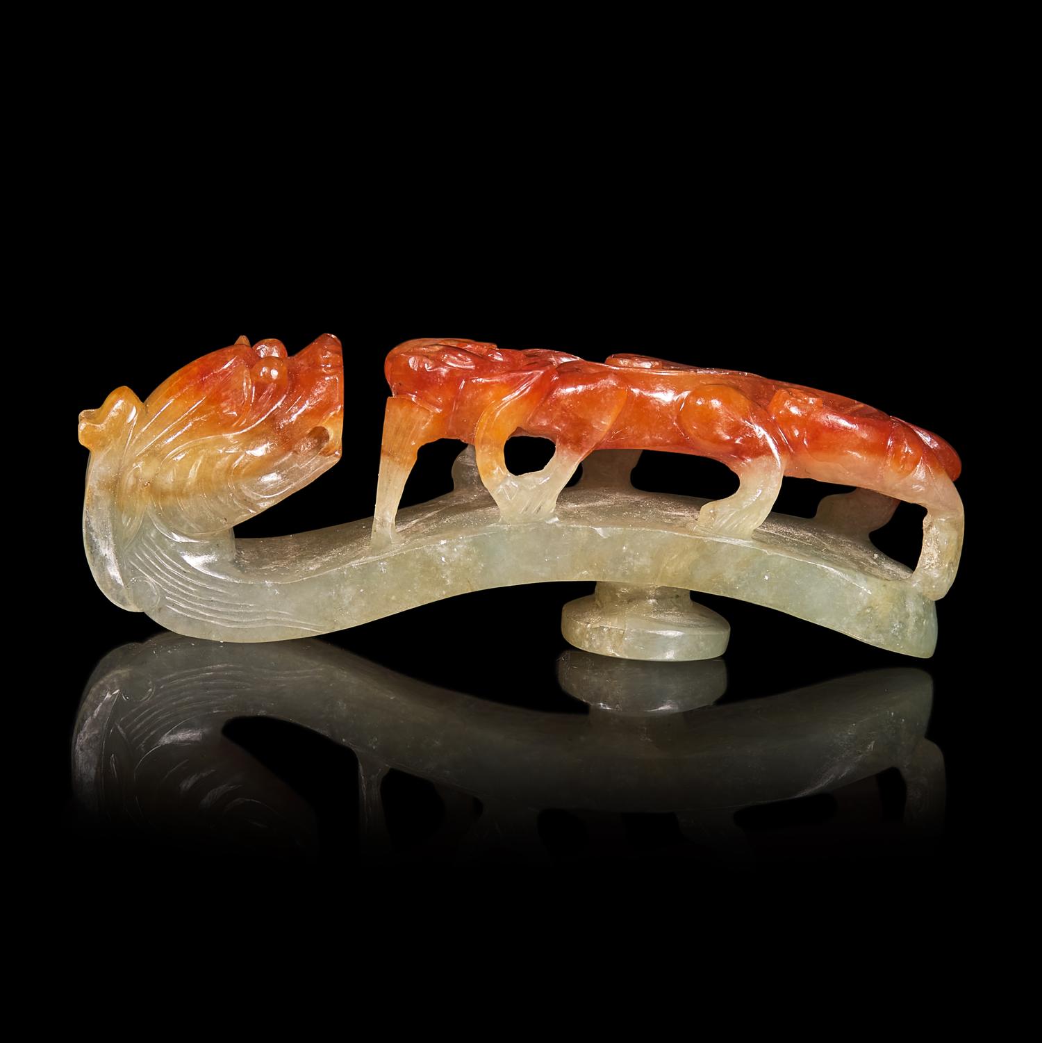 A Chinese Russet and Pale Celadon Jadeite "Dragons" Belthook 翡翠龍紋帶鉤