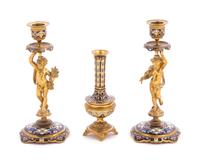 A Pair of Champleve Decorated Gilt Bronze Figural Candlesticks and Vase