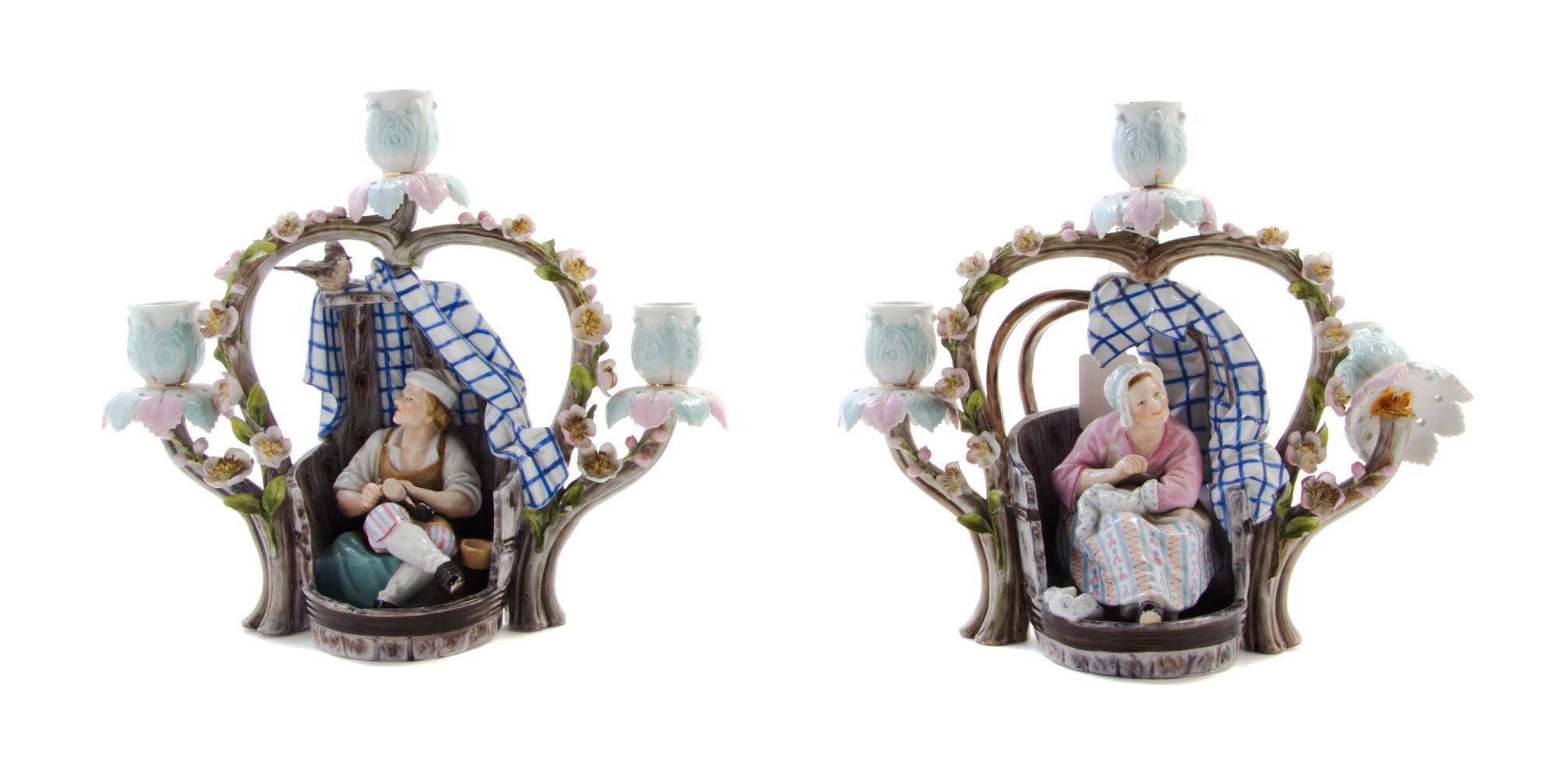 A Pair of Continental Porcelain Three-Light Figural Candelabra Height 9 3/4 inches. — 19TH CENTURY