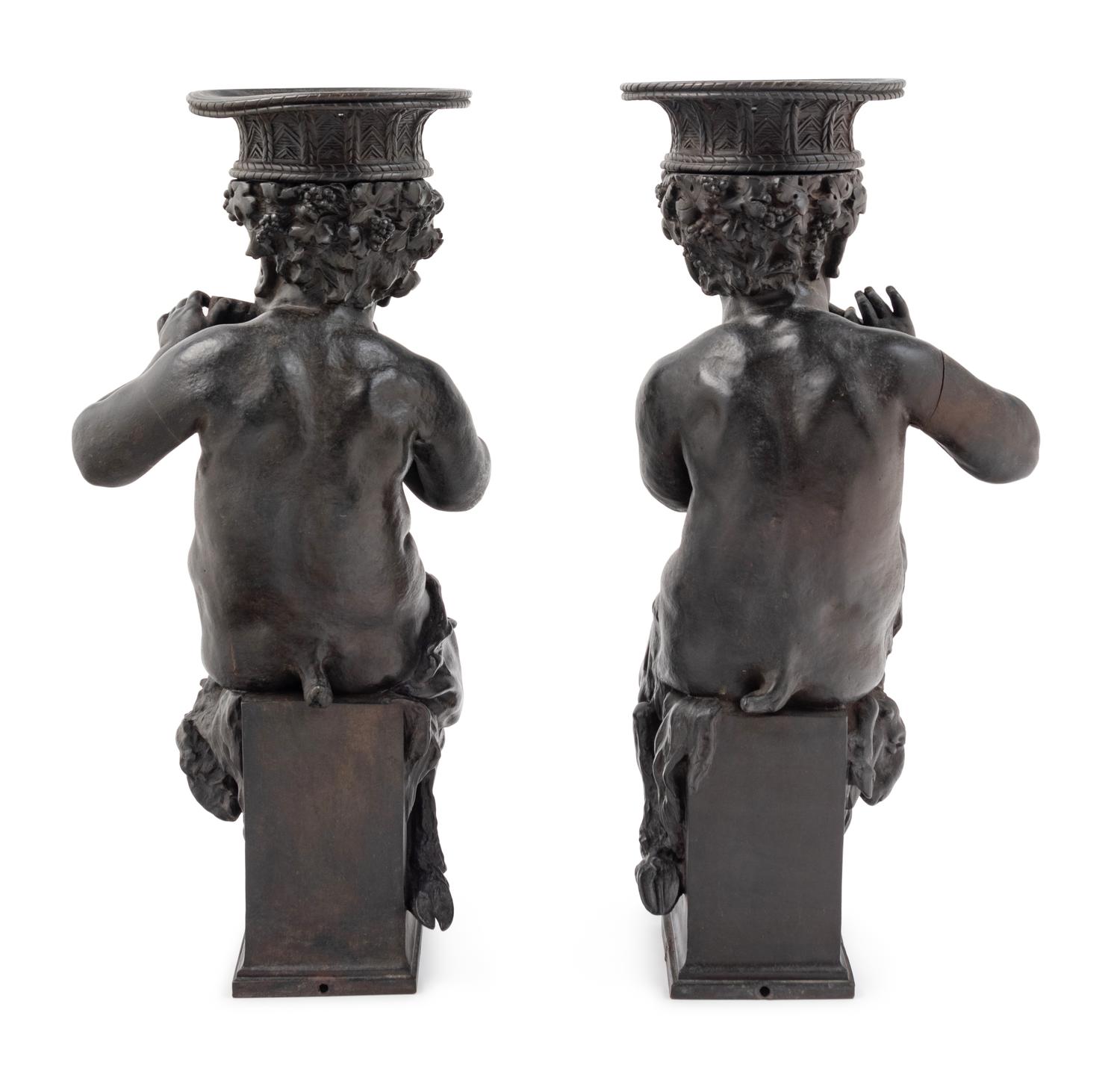 A Pair of Cast Metal Figures of Musical Fauns