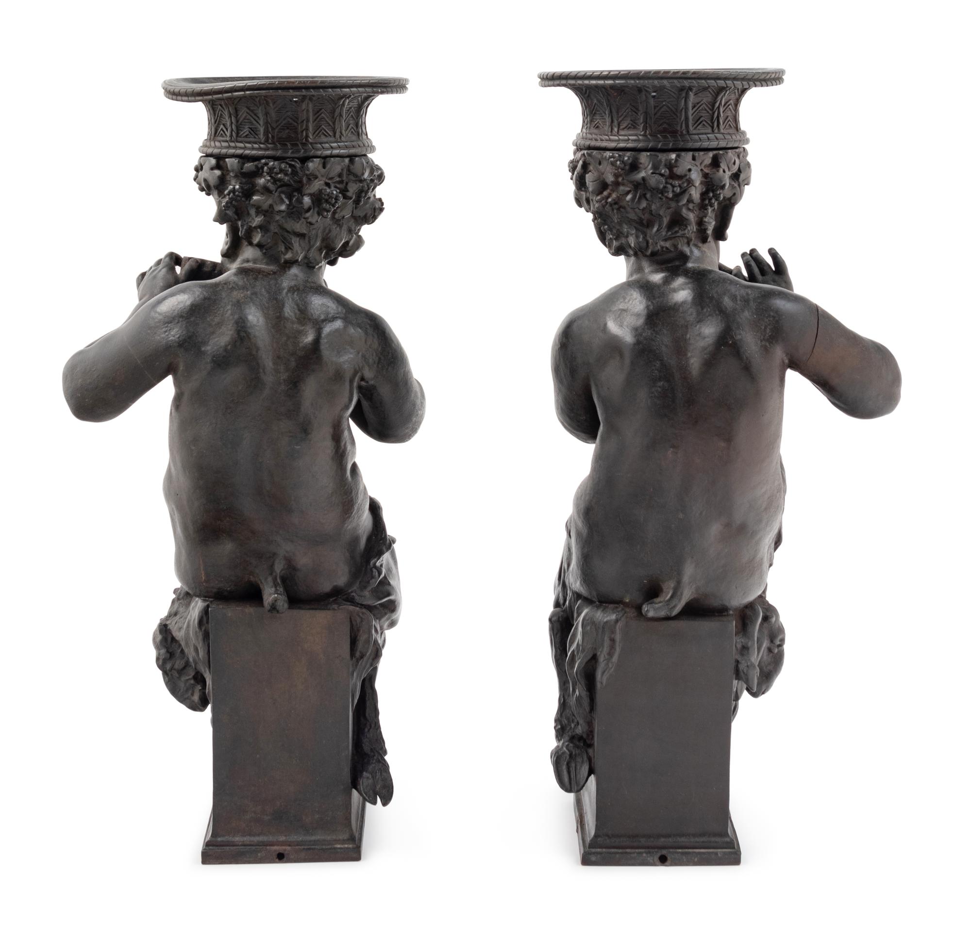 A Pair of Cast Metal Figures of Musical Fauns