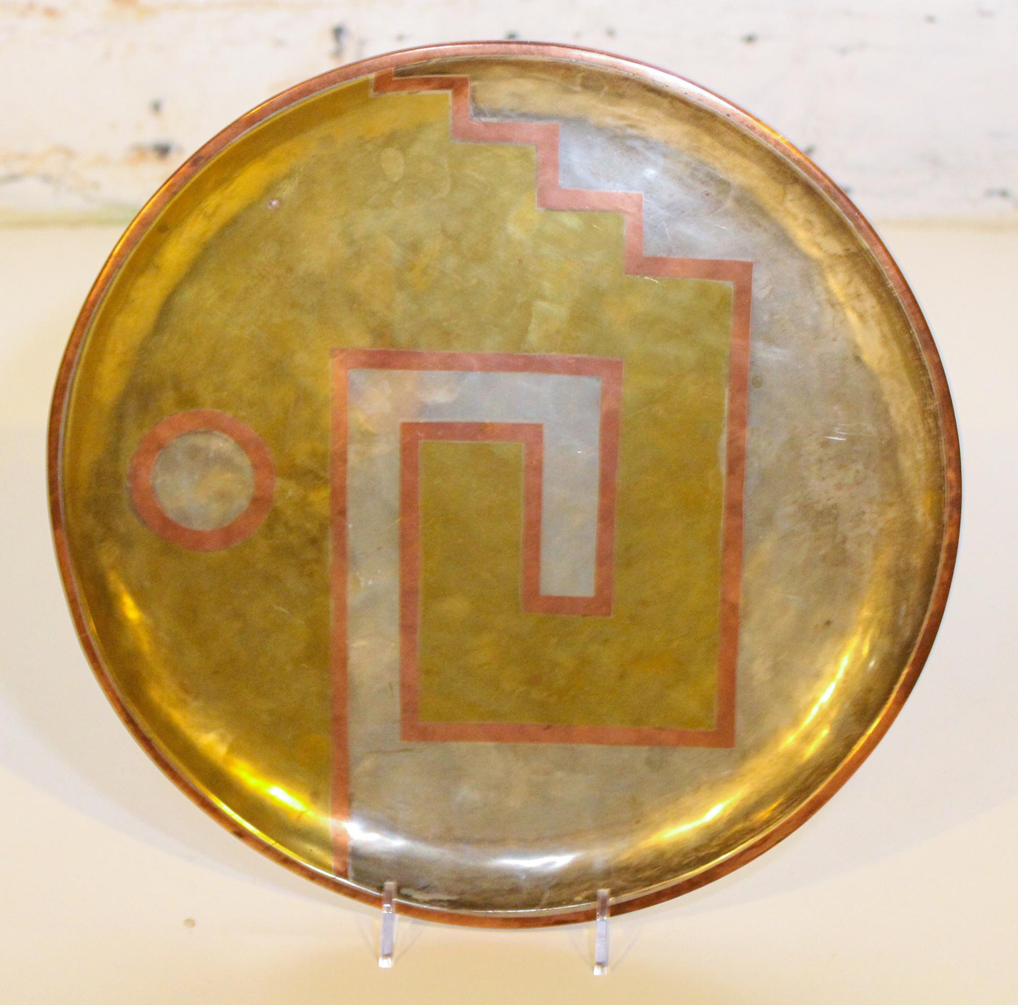 A Mexican Silvered Charger. Diameter 9 3/4 inches.