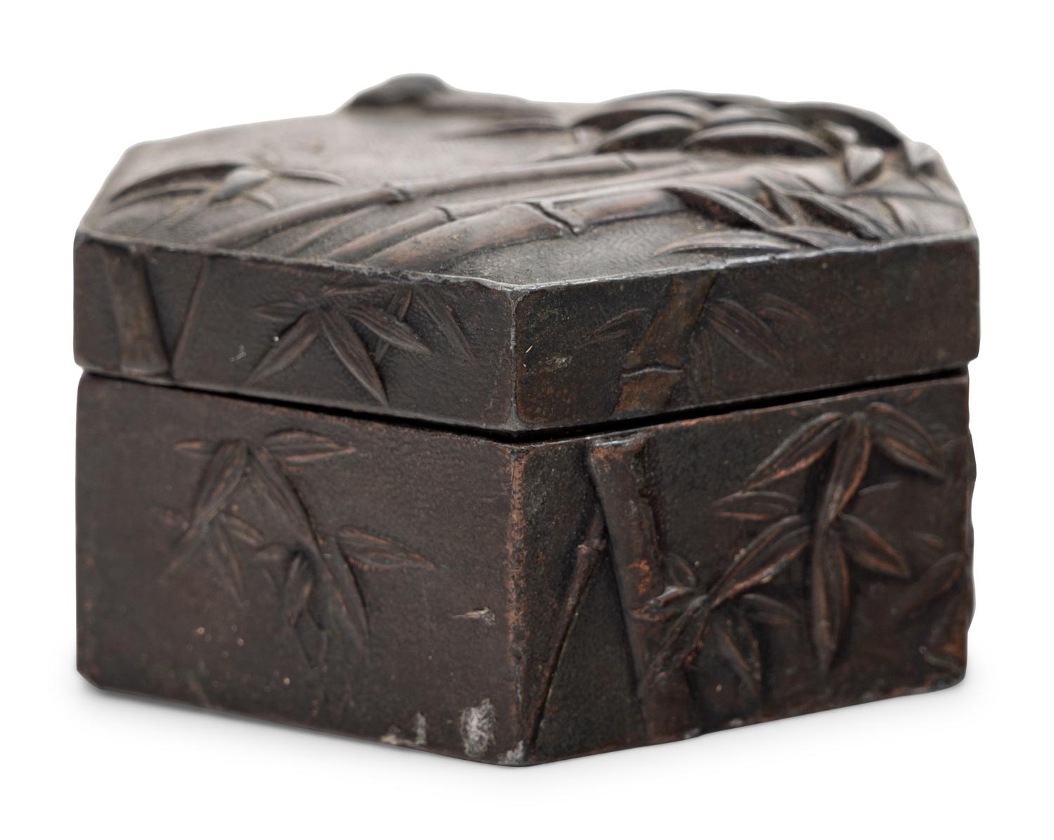 Four Chinese and Japanese Metal Covered Boxes