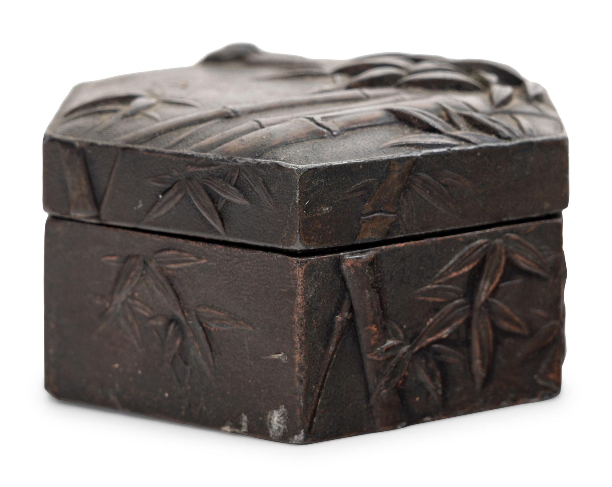 Four Chinese and Japanese Metal Covered Boxes