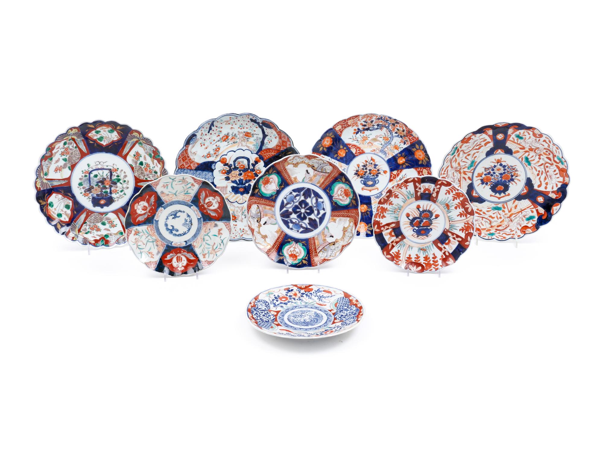 A Group of Eight Imari Pattern Porcelain Plates