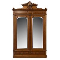 A Victorian Walnut Two Door Armoire 52" W x 22" D x 83" H — United States, Circa 1880