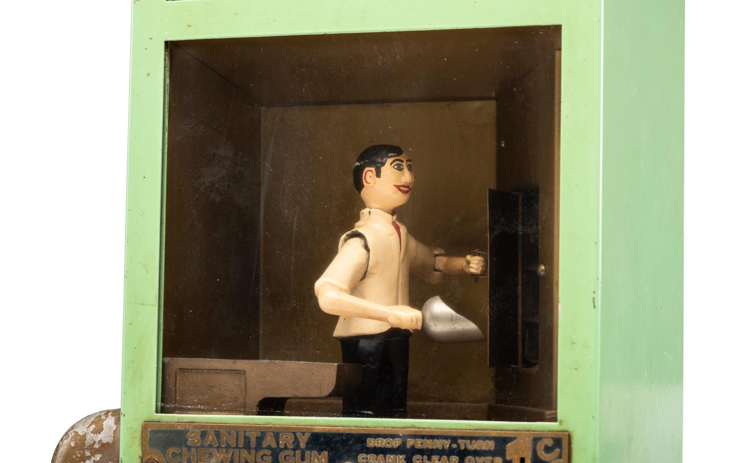 A Manikin Baker Boy Gum Vendor
