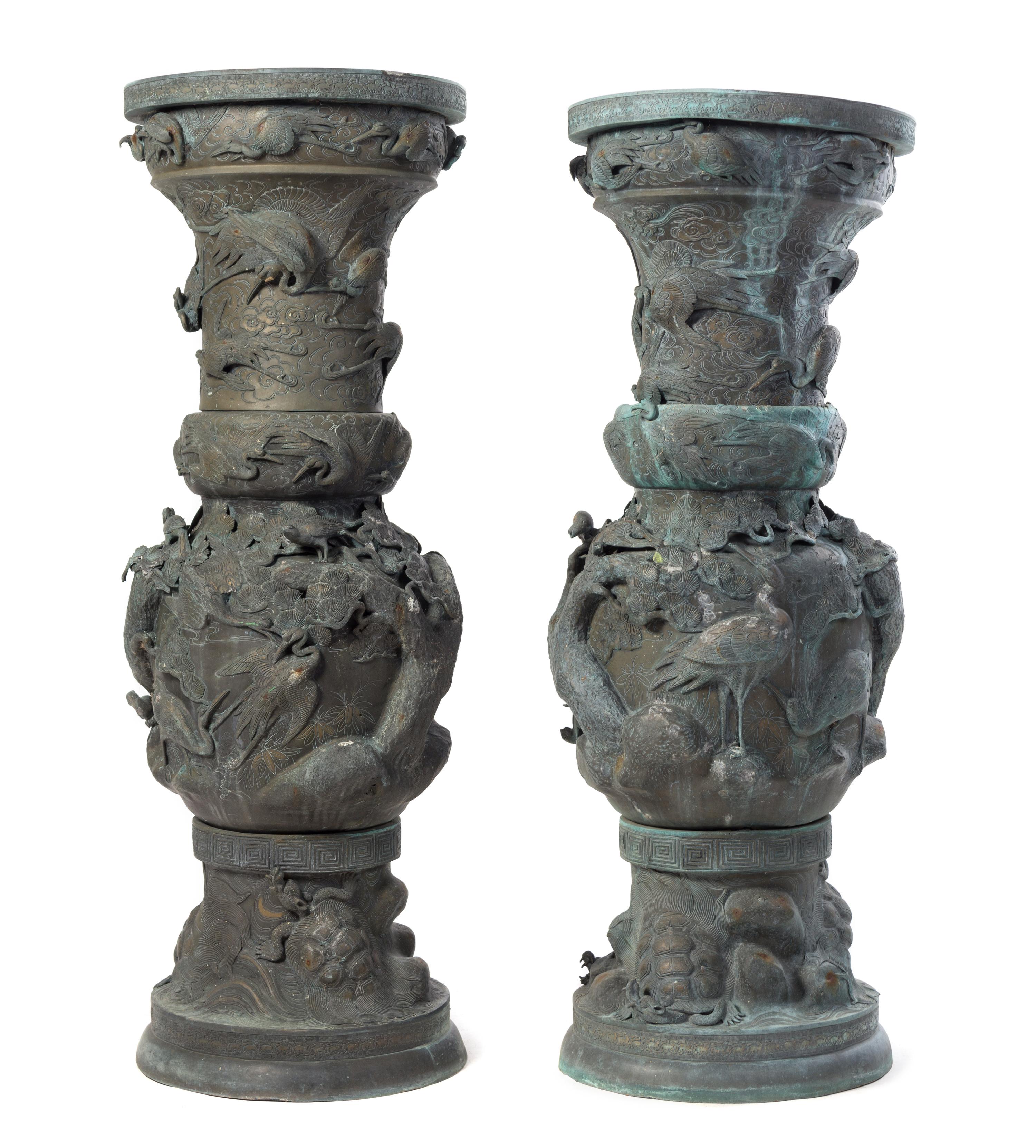 A Pair of Monumental Japanese Patinated Metal Urns Height 54 inches.