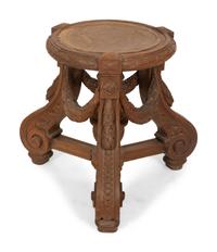 An Italian Carved Walnut Tripod Pedestal Table