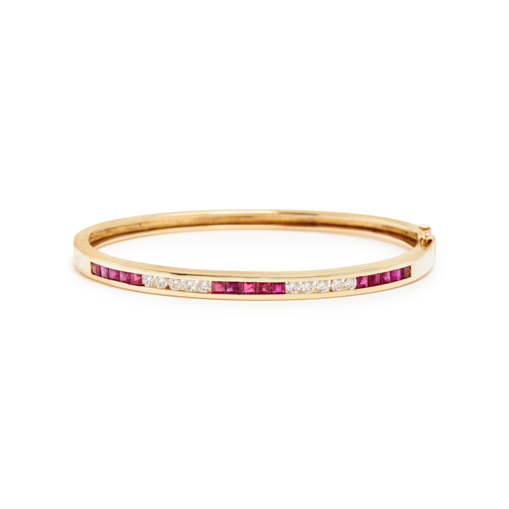 YELLOW GOLD, RUBY, EMERALD, AND DIAMOND BANGLES