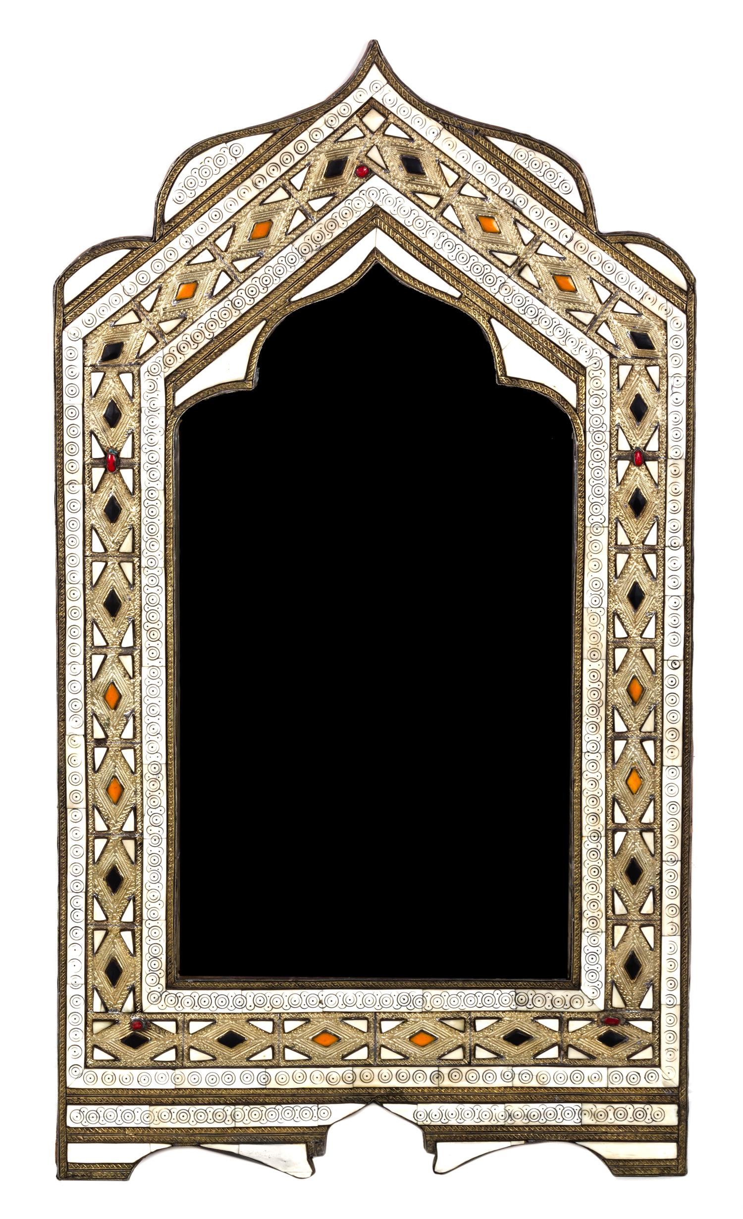 A Middle Eastern Silvered Metal and Bone Inlaid and Hardstone Inlaid Mirror 42 x 23 1/2 inches.