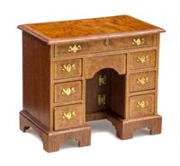 A George III Style Burlwood Kneehole Desk Height 2 1/2 x width 2 7/8 x depth 1 5/8 inches. — John J. Hodgson, 1997