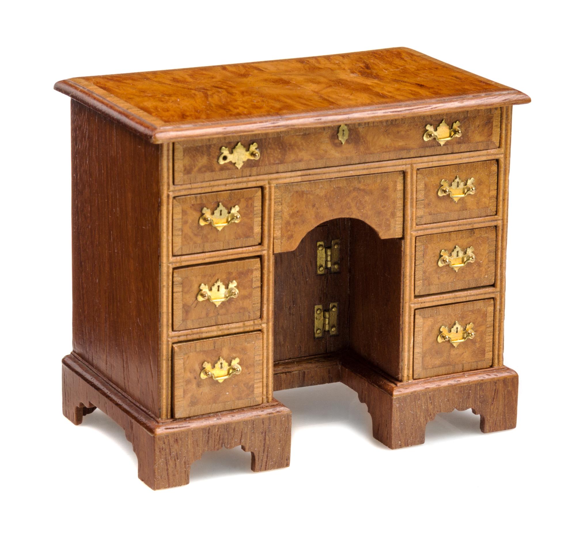 A George III Style Burlwood Kneehole Desk Height 2 1/2 x width 2 7/8 x depth 1 5/8 inches. — John J. Hodgson, 1997