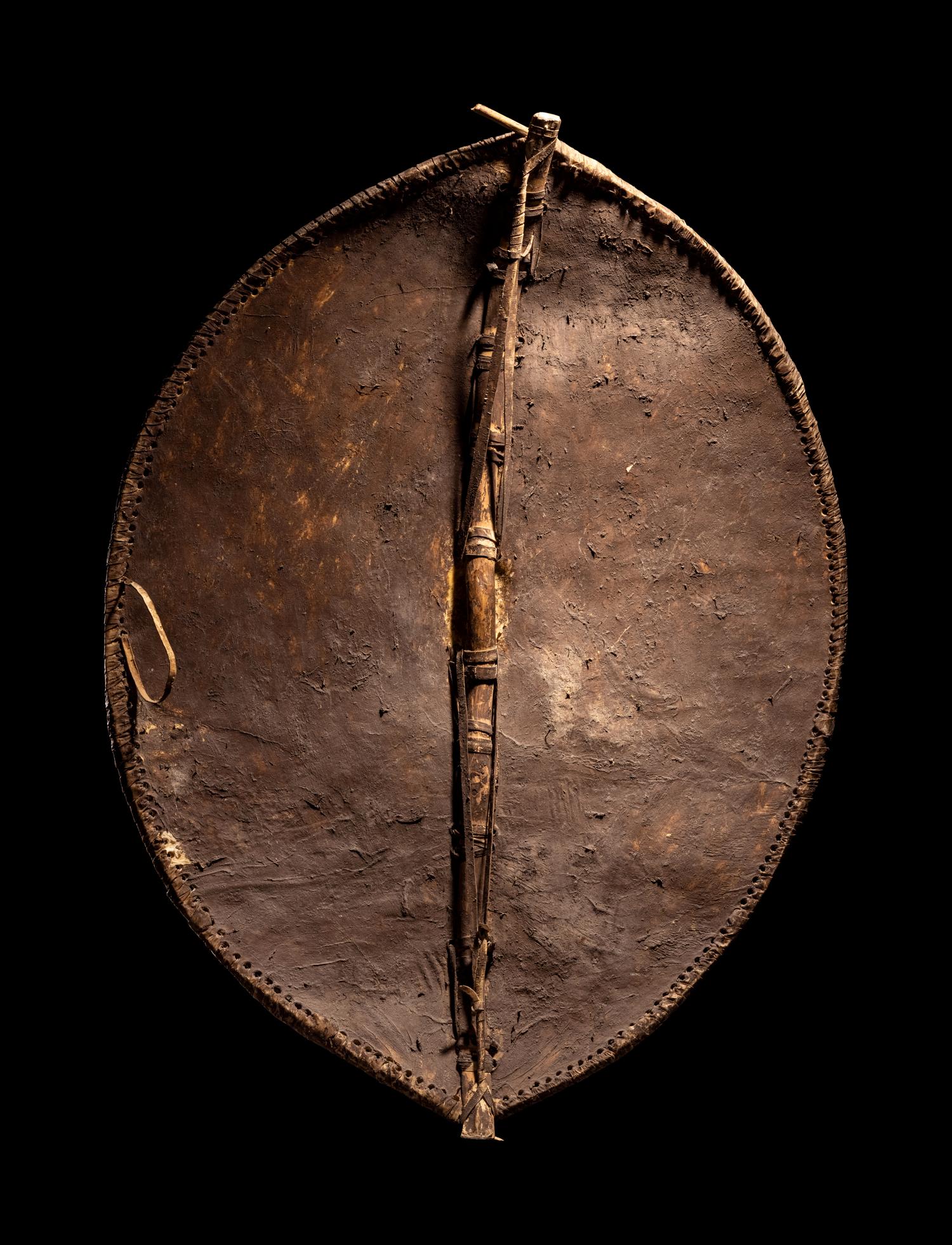 A Maasai Painted Hide Shield and Milk Gourd