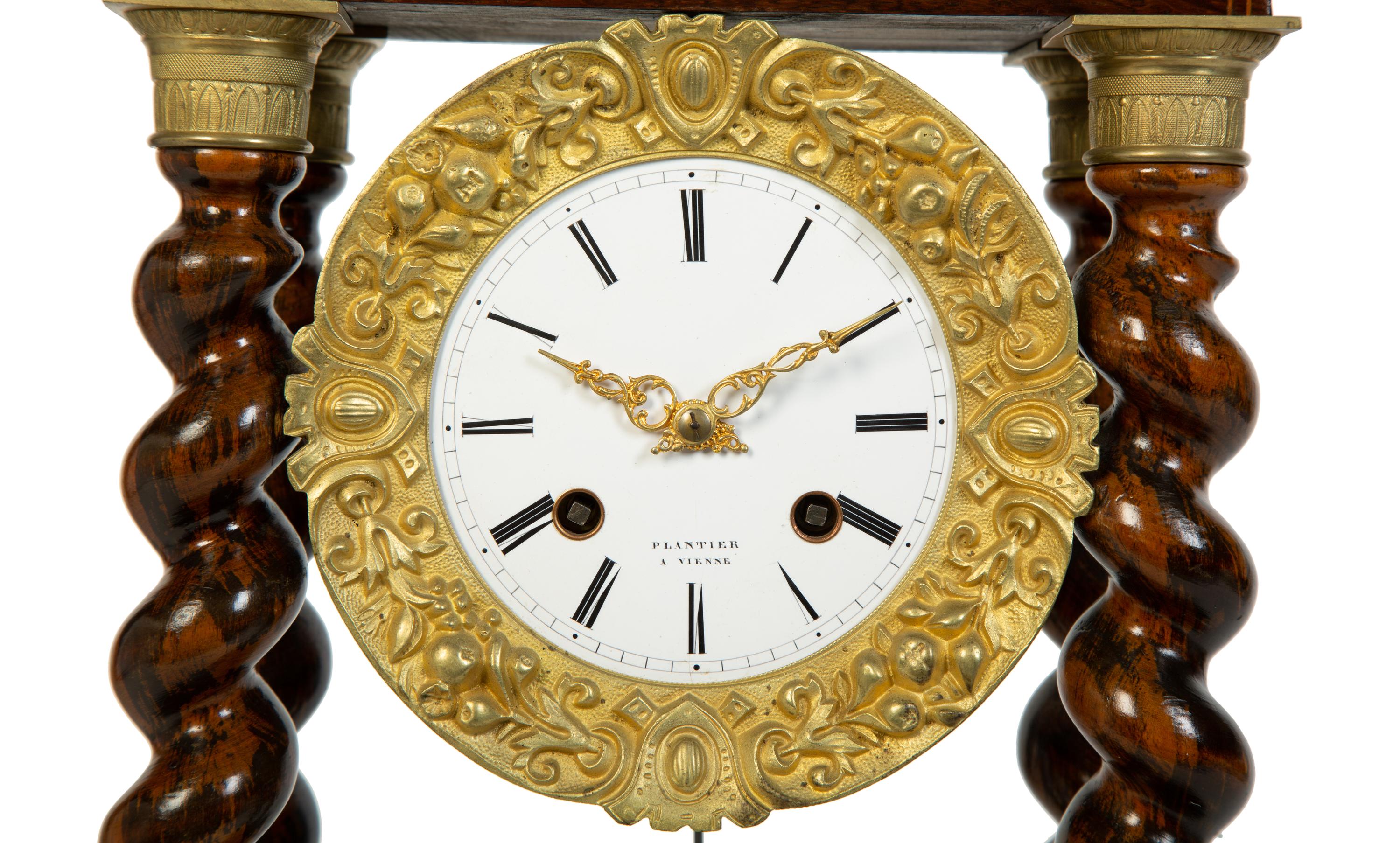 A Charles X Gilt Bronze Mounted Marquetry Portico Clock