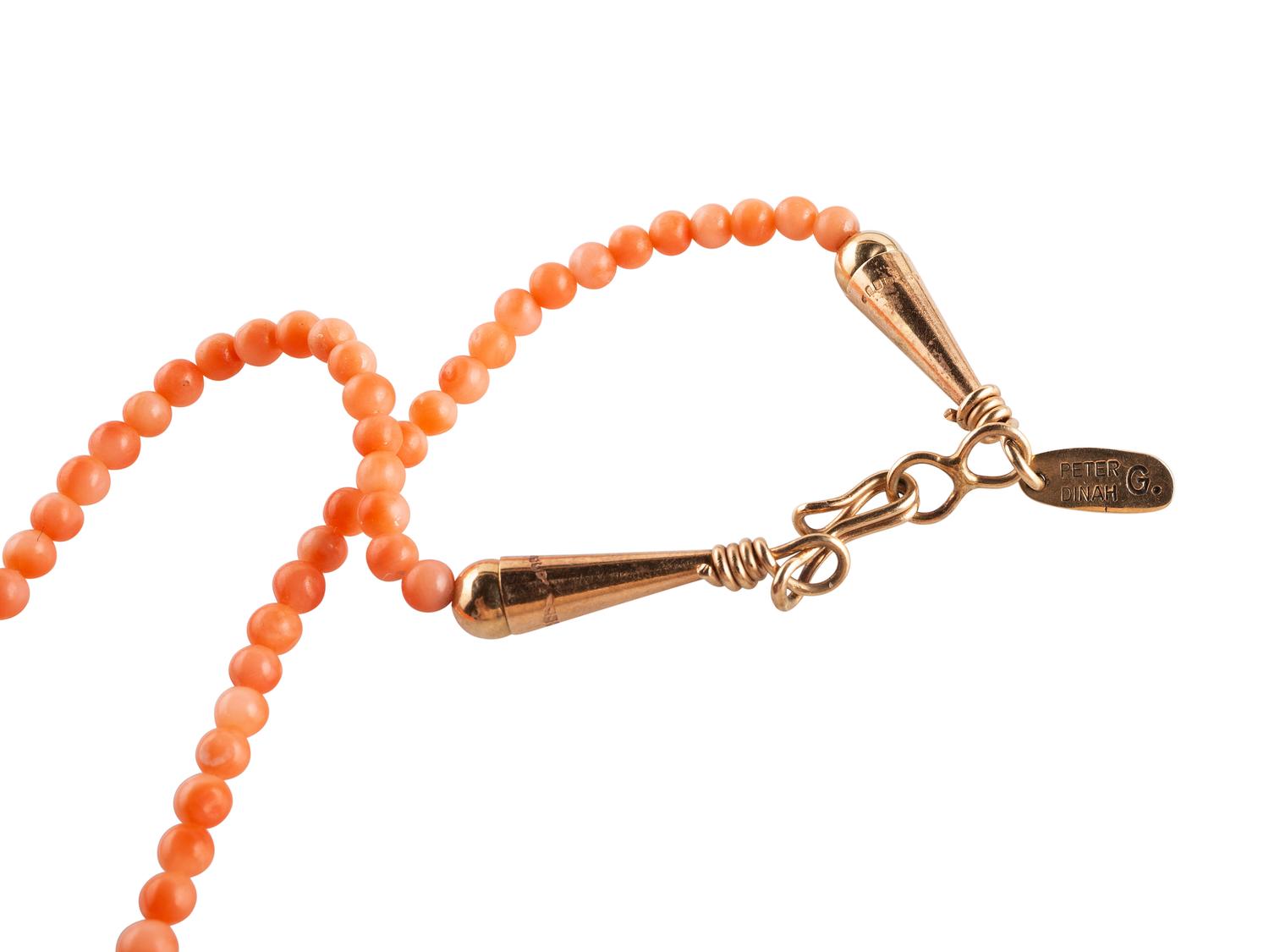 Single-strand Coral Necklace, with Sugilite Fetishes and Gold Findings