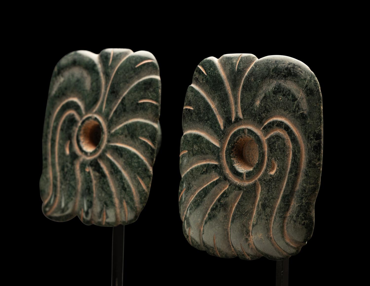 A Pair of Maya Jade Earspools in the Form of a Quetzal Bird
