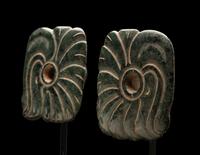 A Pair of Maya Jade Earspools in the Form of a Quetzal Bird