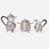 A miniature Continental silver repoussé three-piece coffee service, probably 19th century