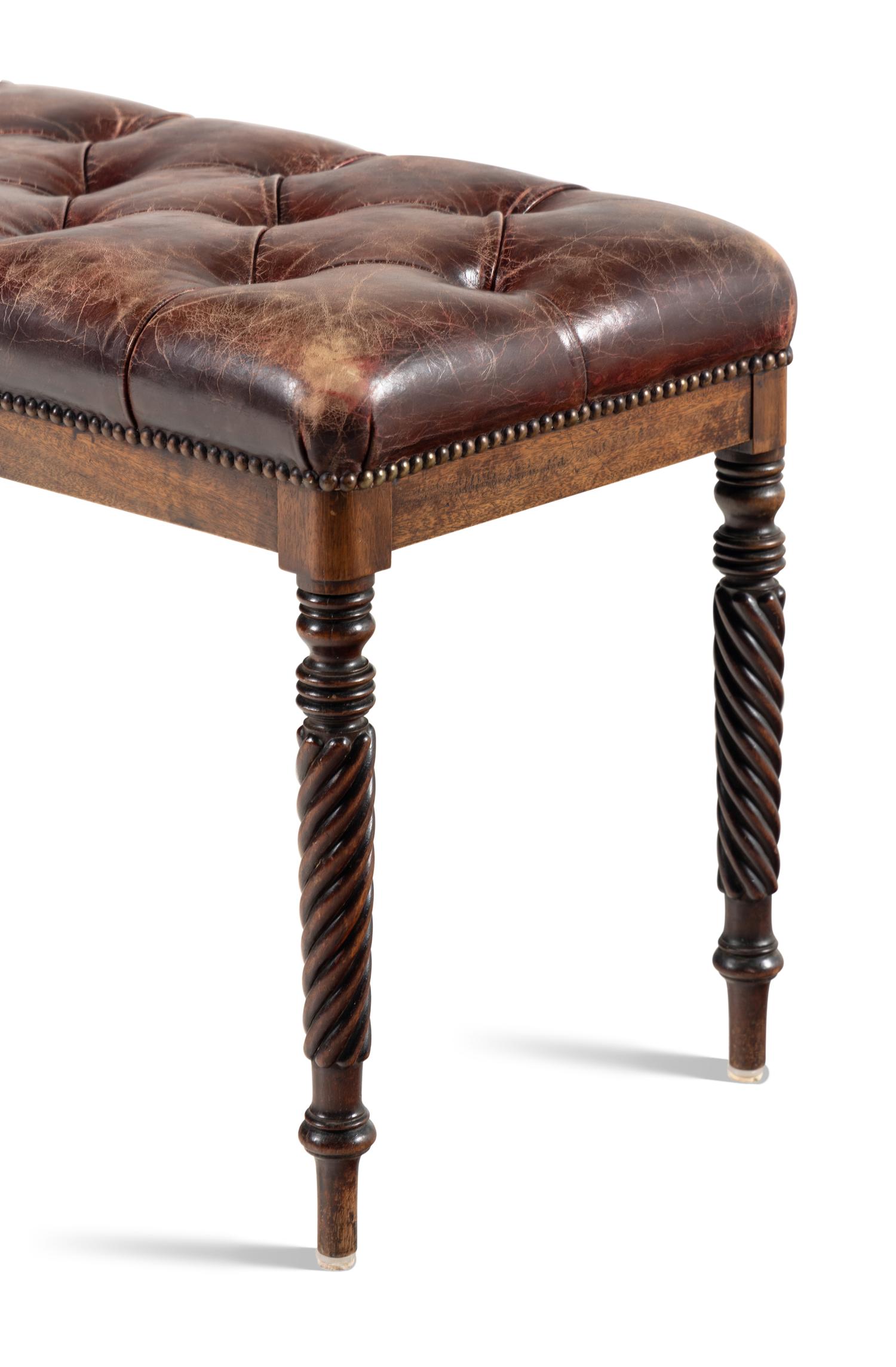 A Button-Tufted Leather Upholstered Bench