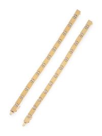 PAIR OF YELLOW GOLD NAIL HEAD MOTIF BRACELETS