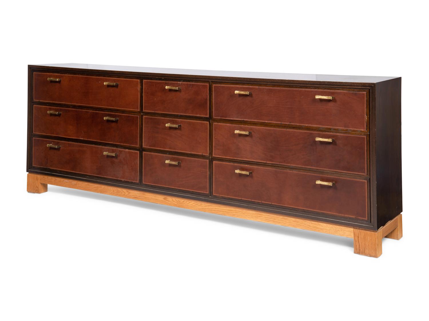 An Oak and Leather-Veneered and Brass Mounted Cabinet