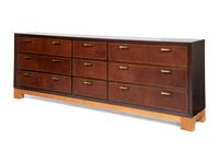 An Oak and Leather-Veneered and Brass Mounted Cabinet
