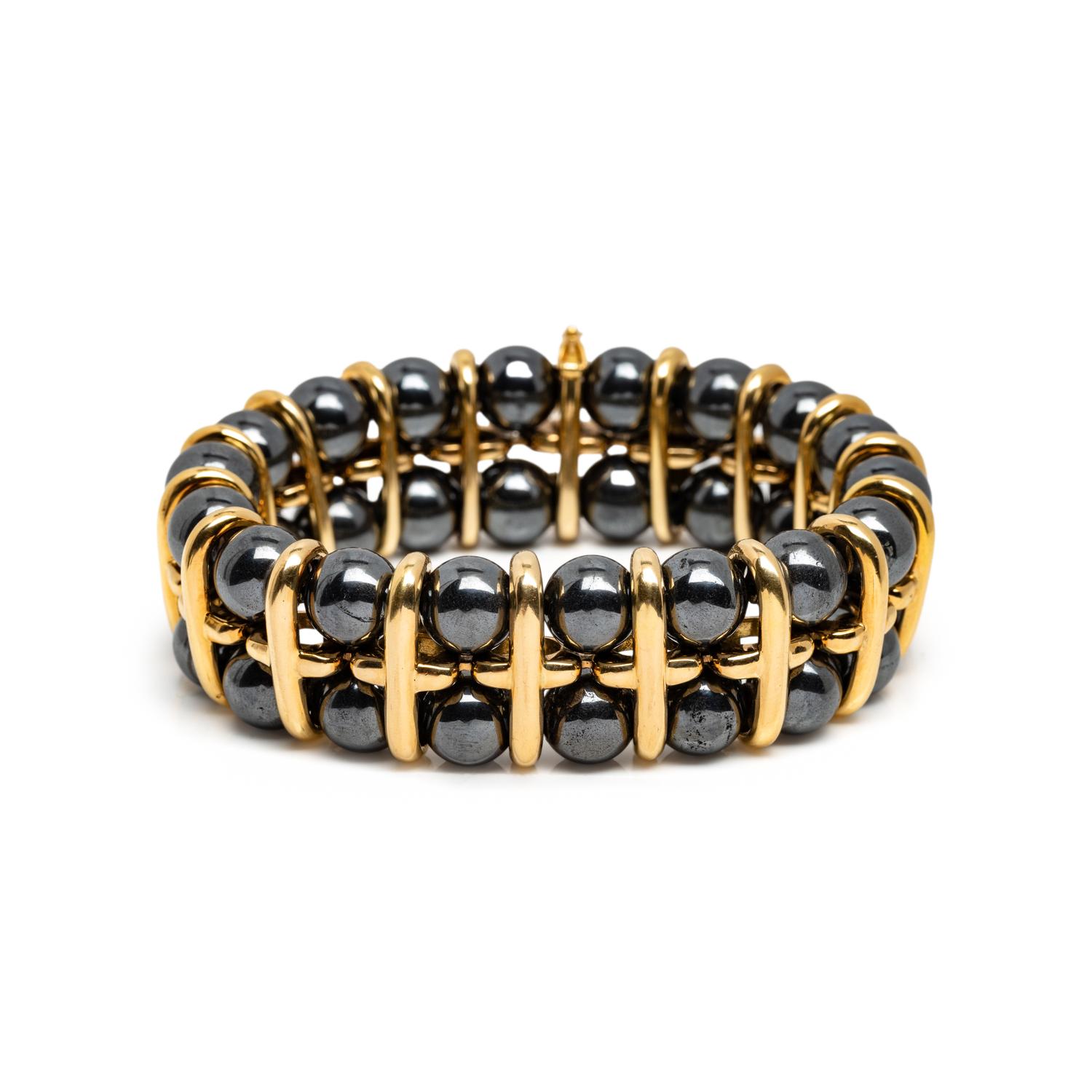 POIRAY, YELLOW GOLD AND HEMATITE BRACELET
