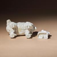 Two Chinese Blanc-de-Chine Porcelain Figural Groups of Foreigners Riding on Qilin, Late 17th-Early 18th Century — 清中期 德化白瓷骑麒麟西人像兩件