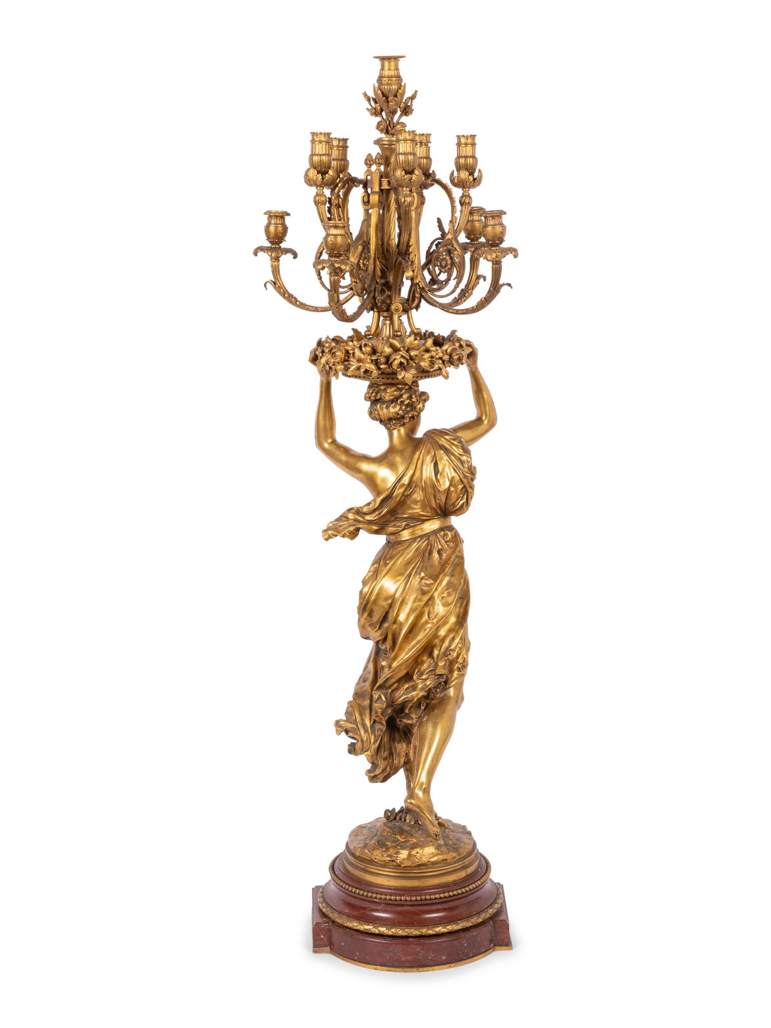 A Large French Gilt Bronze and Marble Figural Candelabrum