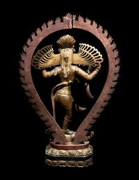 A Large Gilt and Red Lacquered Wood Figure of a Dancing Deity