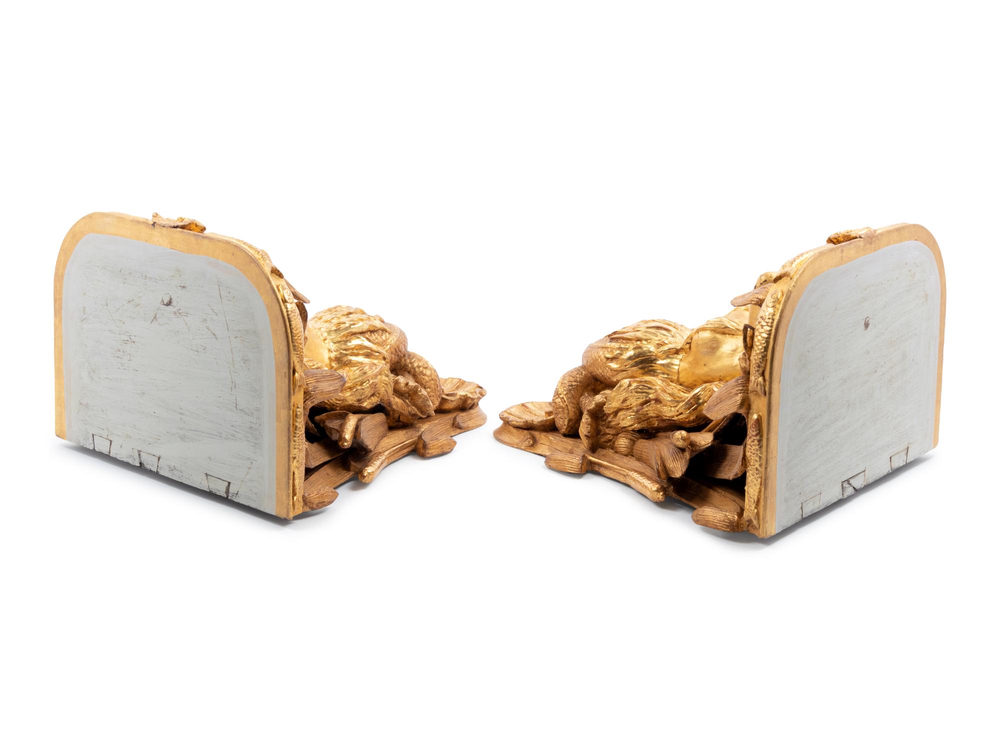 A Pair of English Carved Giltwood Figural Wall Brackets