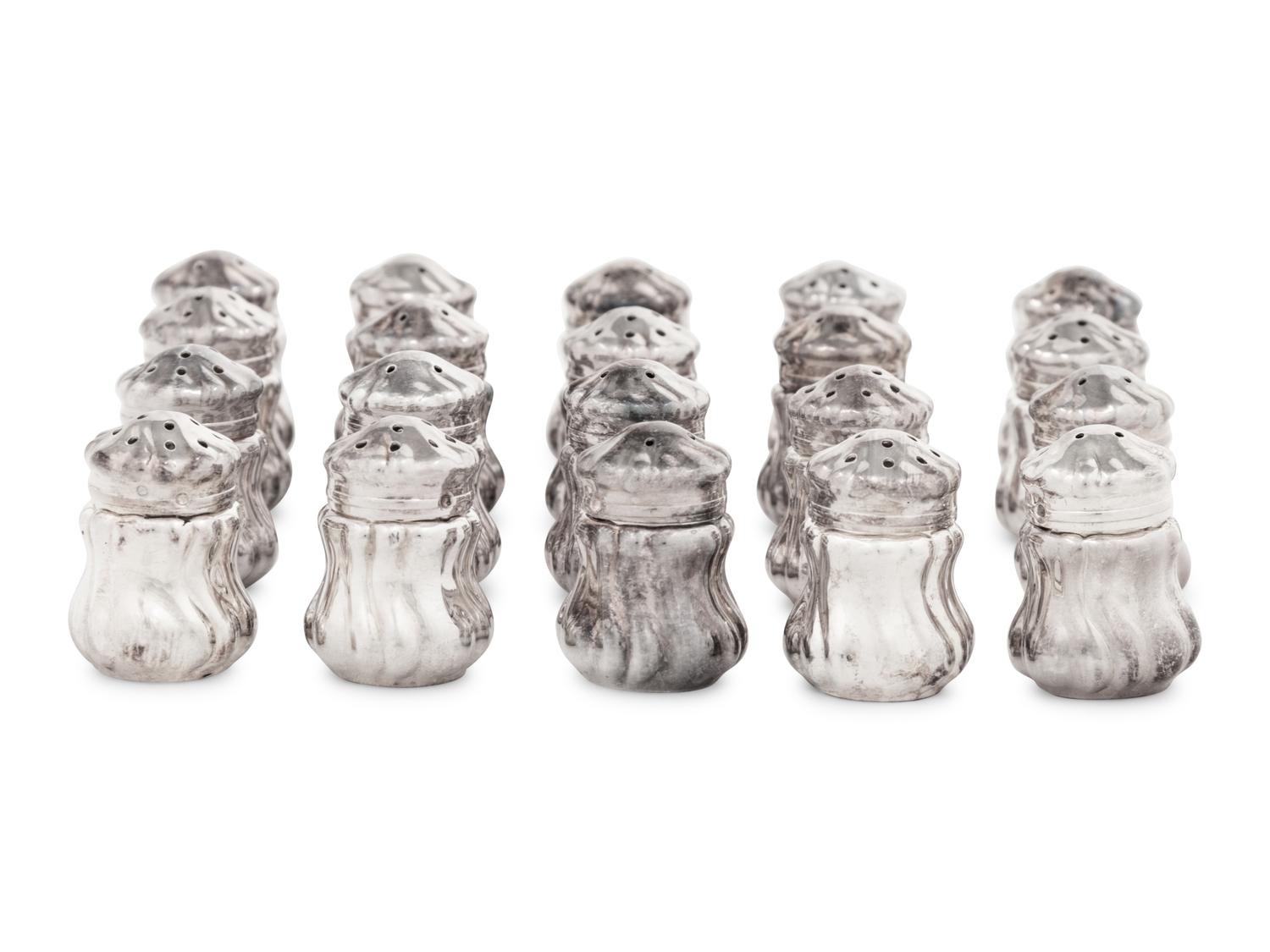 A Set of Twenty Silver Shakers
