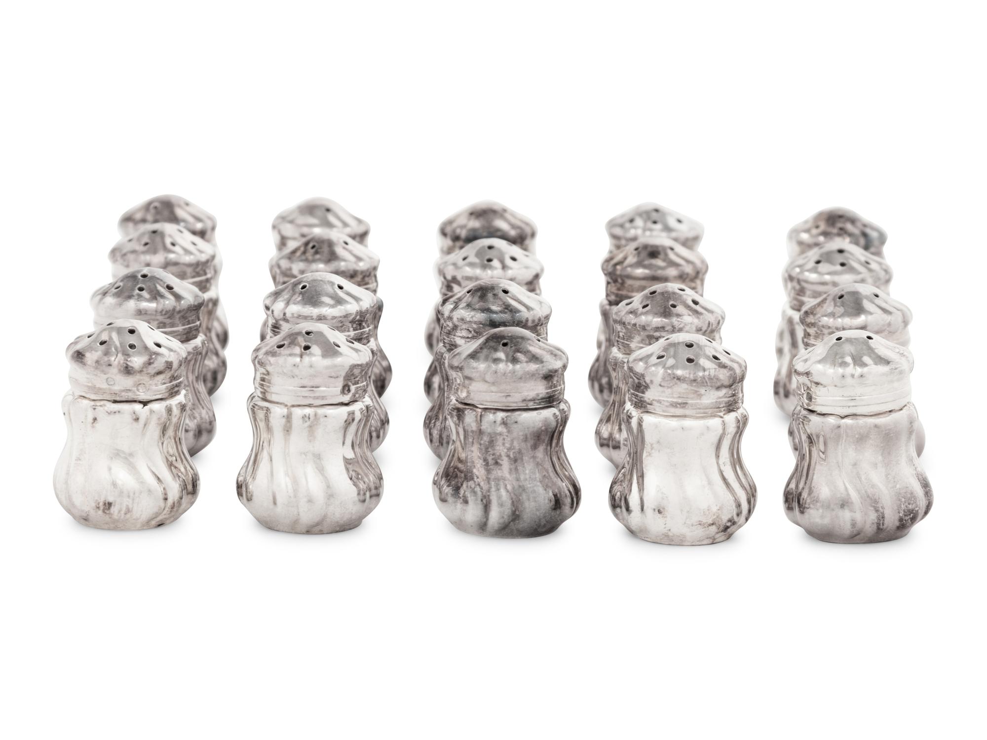 A Set of Twenty Silver Shakers
