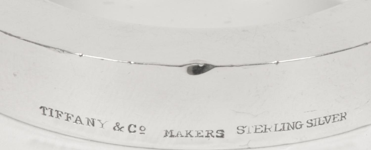 A Pair of Tiffany and Co. Silver Paperweights