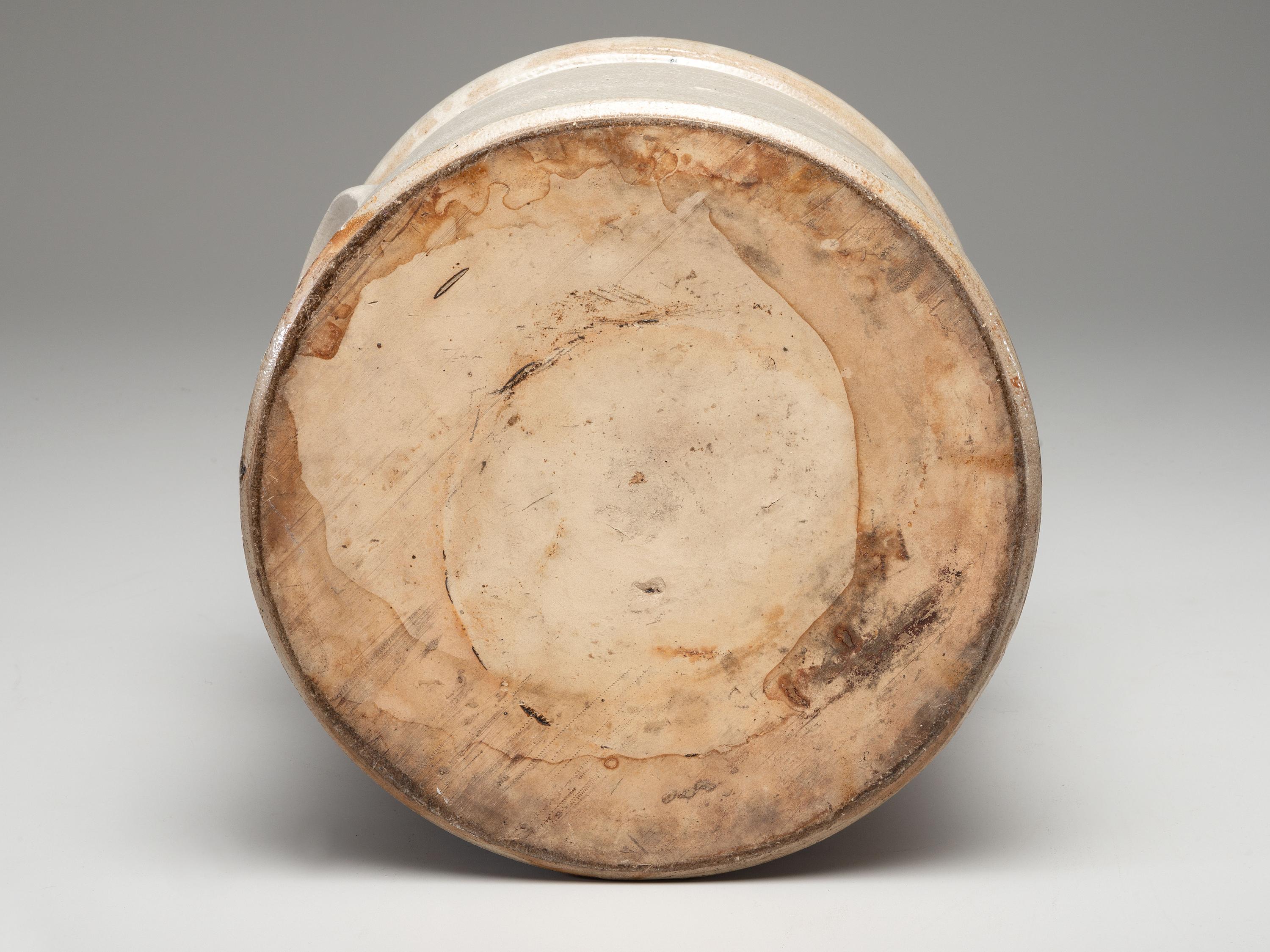 A Haxtun and Co. Four-Gallon Cobalt Decorated Stoneware Crock