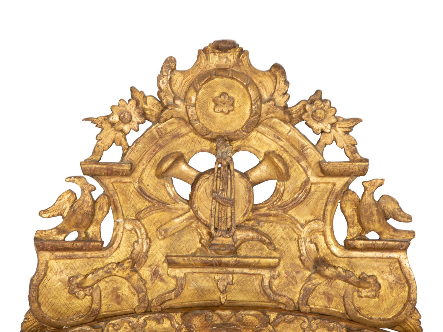A Continental Carved Giltwood Wall Mirror
