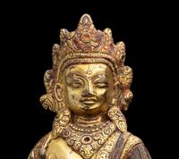 A Nepalese Gilt Bronze Standing Figure of Dipankara