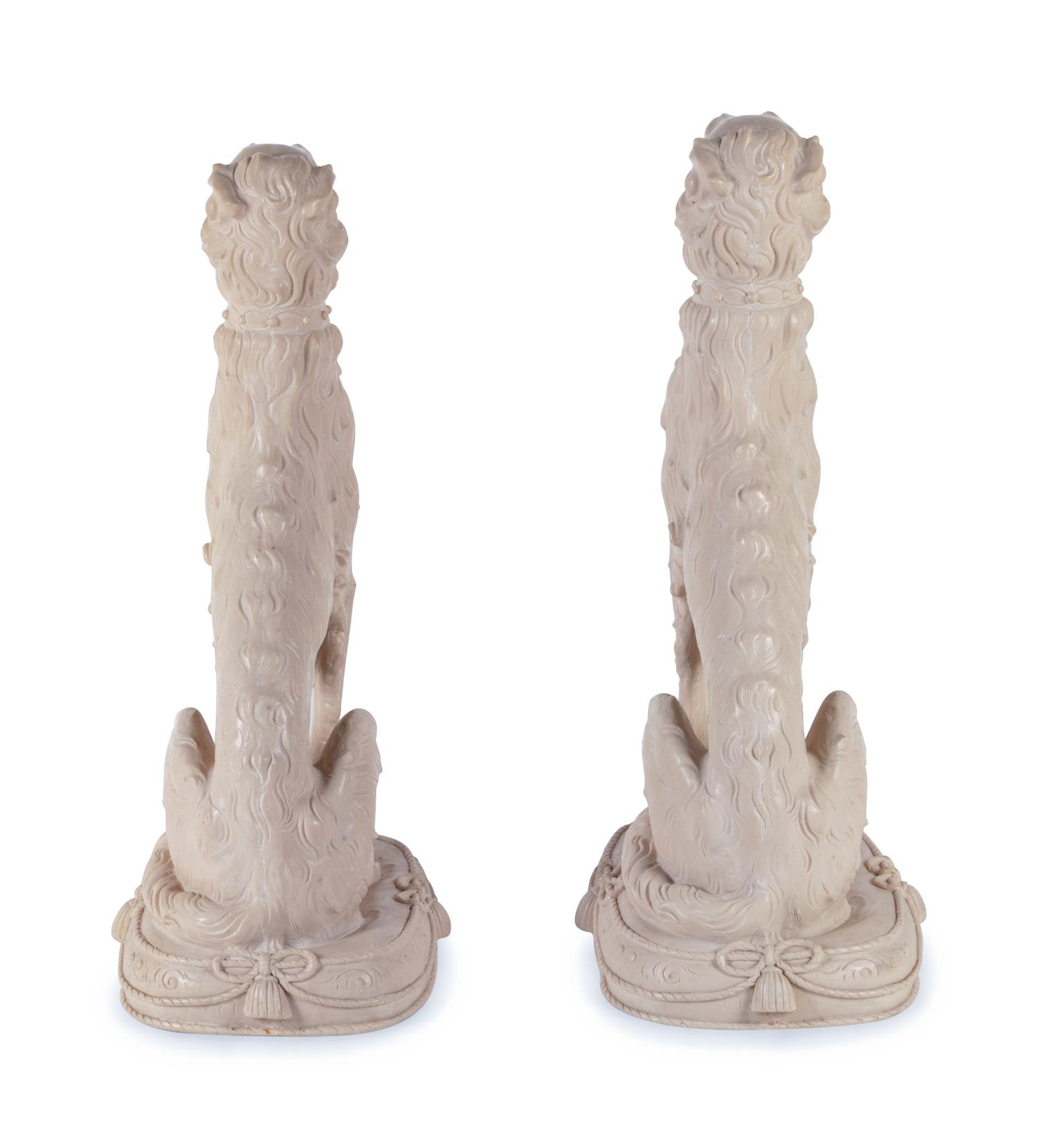 A Pair of Resin Models of Seated Hounds
