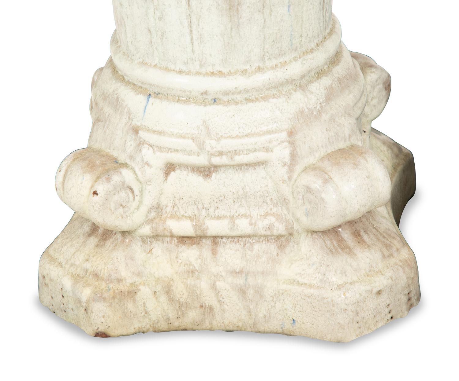A Pair of Italian Glazed Ceramic Columnar Low Pedestals