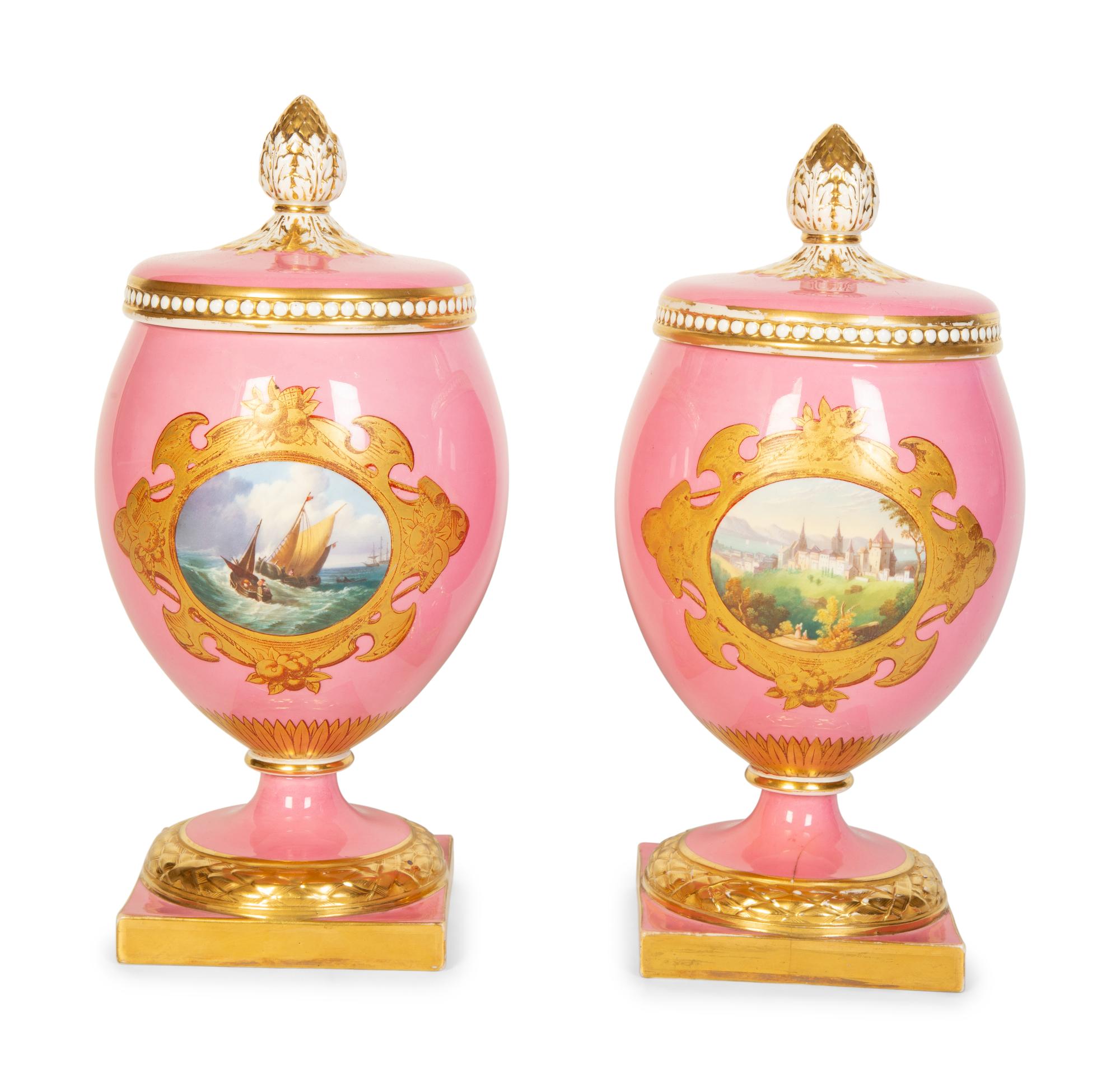 A Pair of English or Continental Porcelain Pink-Glazed Urns