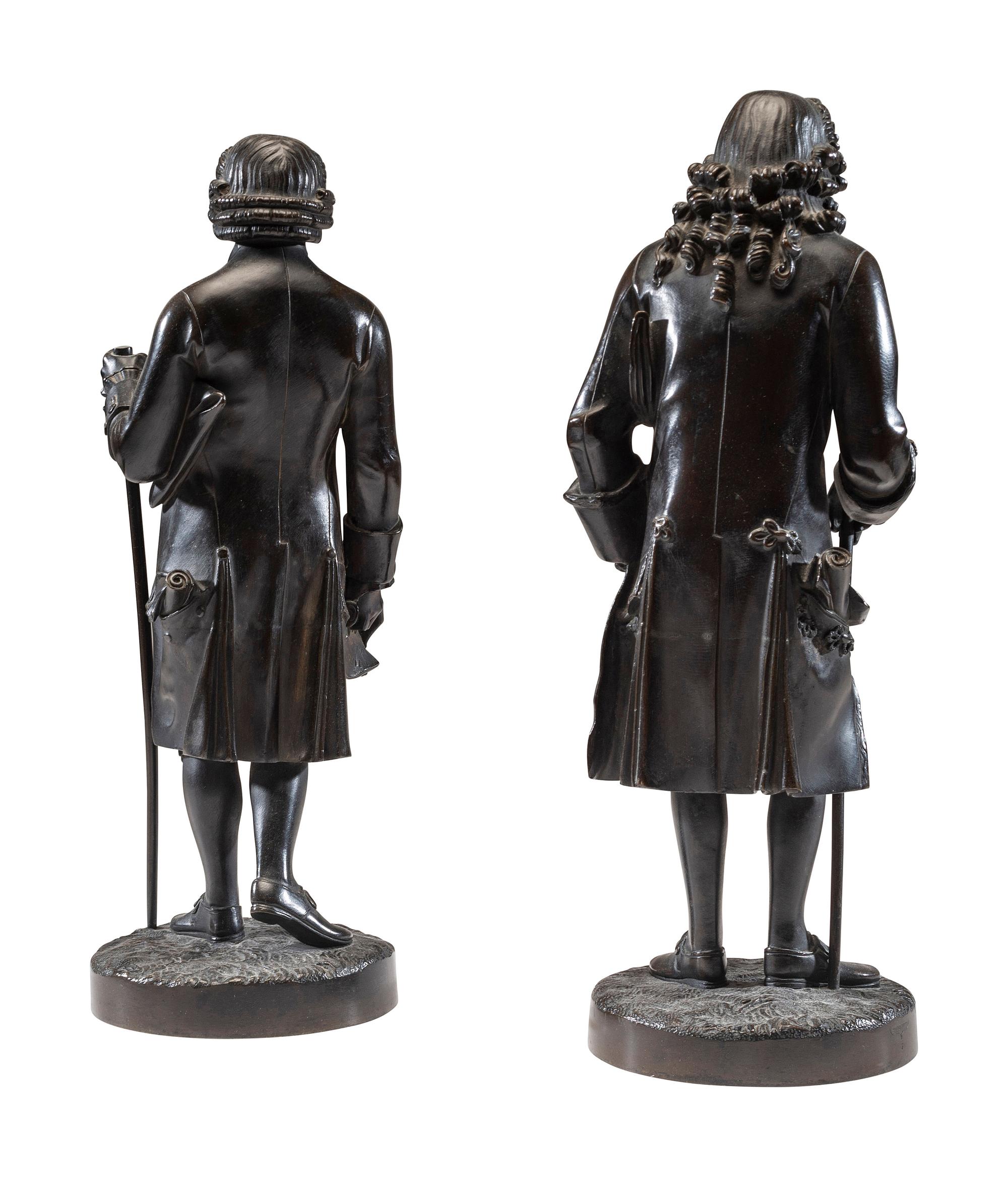 Two French Patinated Bronze Figures of Voltaire and Rousseau