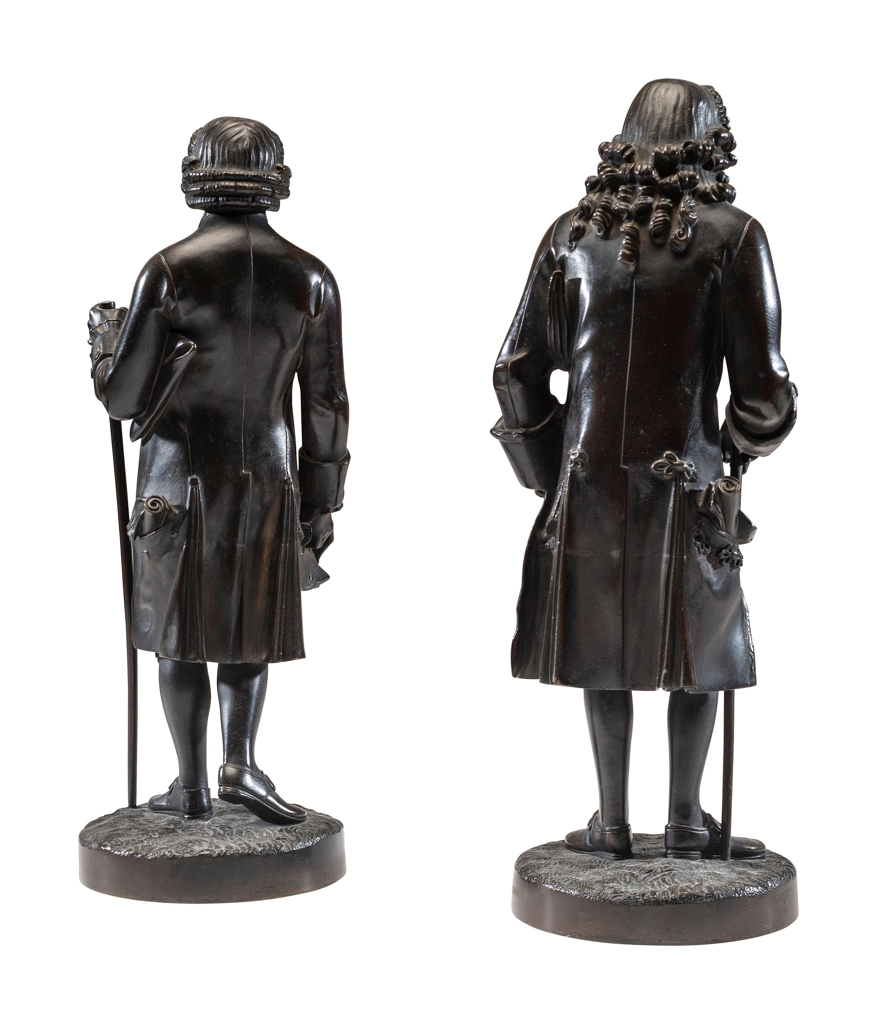 Two French Patinated Bronze Figures of Voltaire and Rousseau