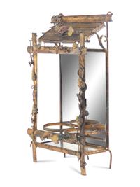A Palais Royal Gilt Metal Hanging Vase Caddy