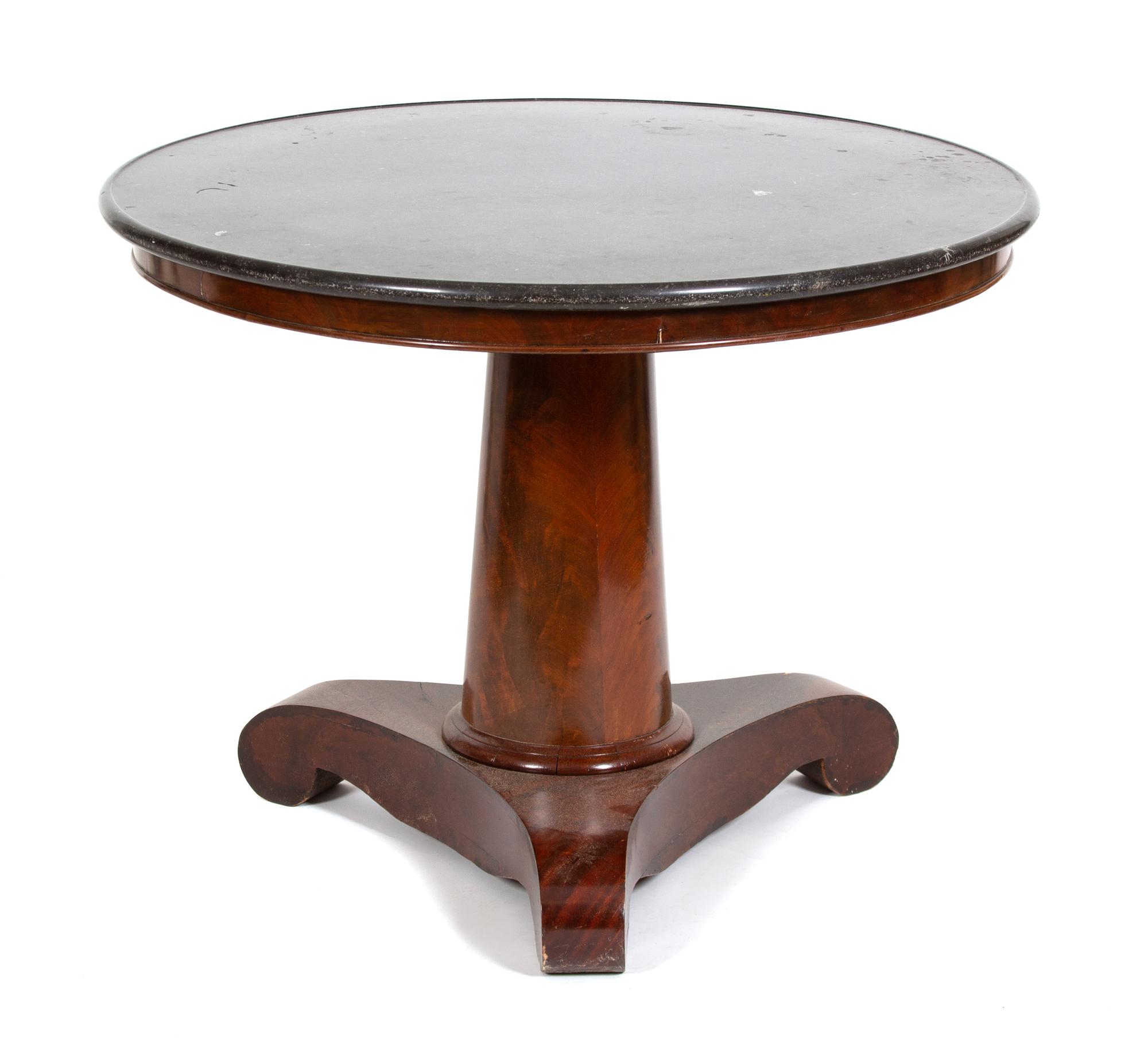 A Napoleon III Mahogany Marble Top Table Height 29 x diameter 38 1/4 inches. — 19TH CENTURY