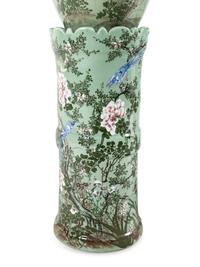 A Pair of Chinese Large Porcelain Covered Urns on Pedestals