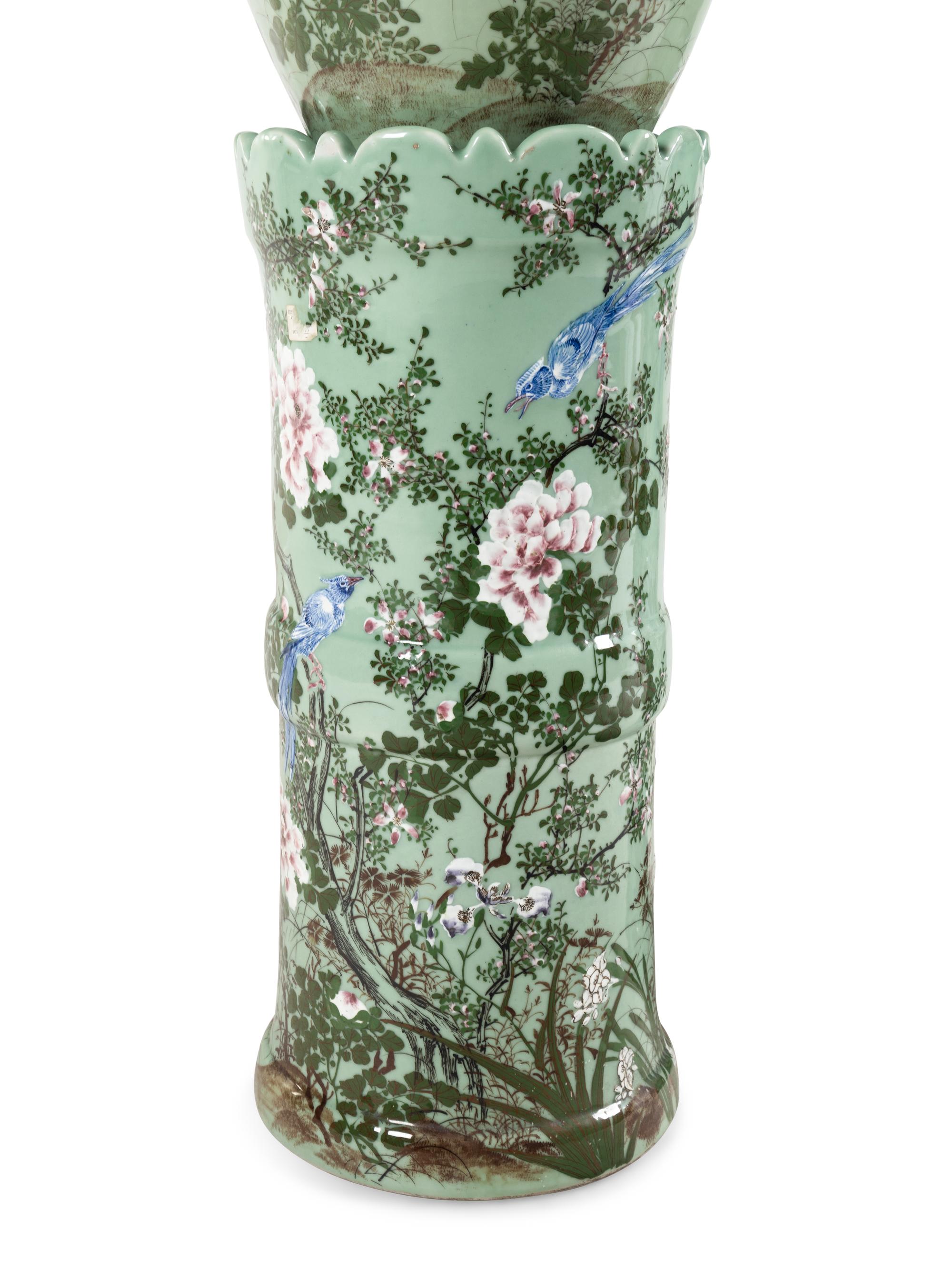 A Pair of Chinese Large Porcelain Covered Urns on Pedestals