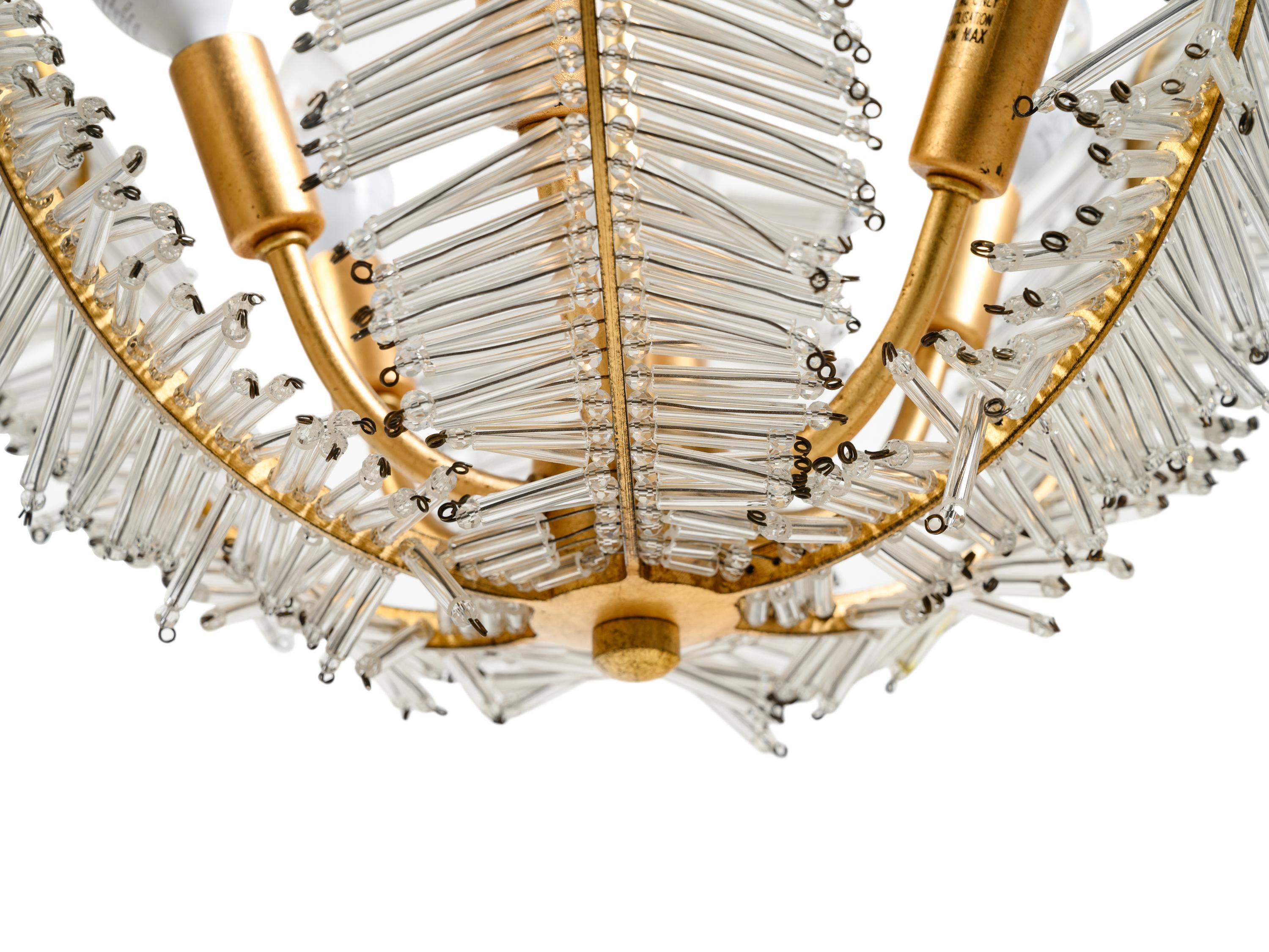 A Contemporary Gilt Metal and Glass "Palm Frond" Chandelier