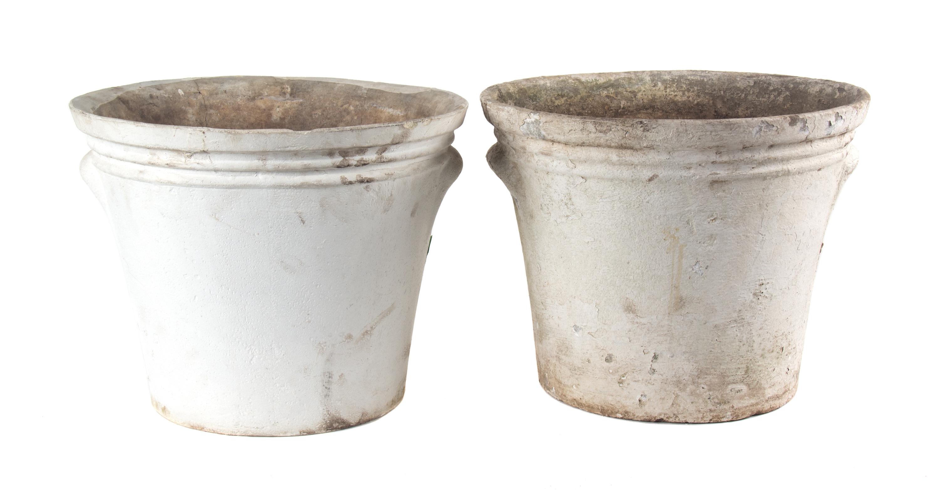 A Group of 6 Concrete Planters Height of largest 13 1/2 inches x depth 16 1/2 inches.