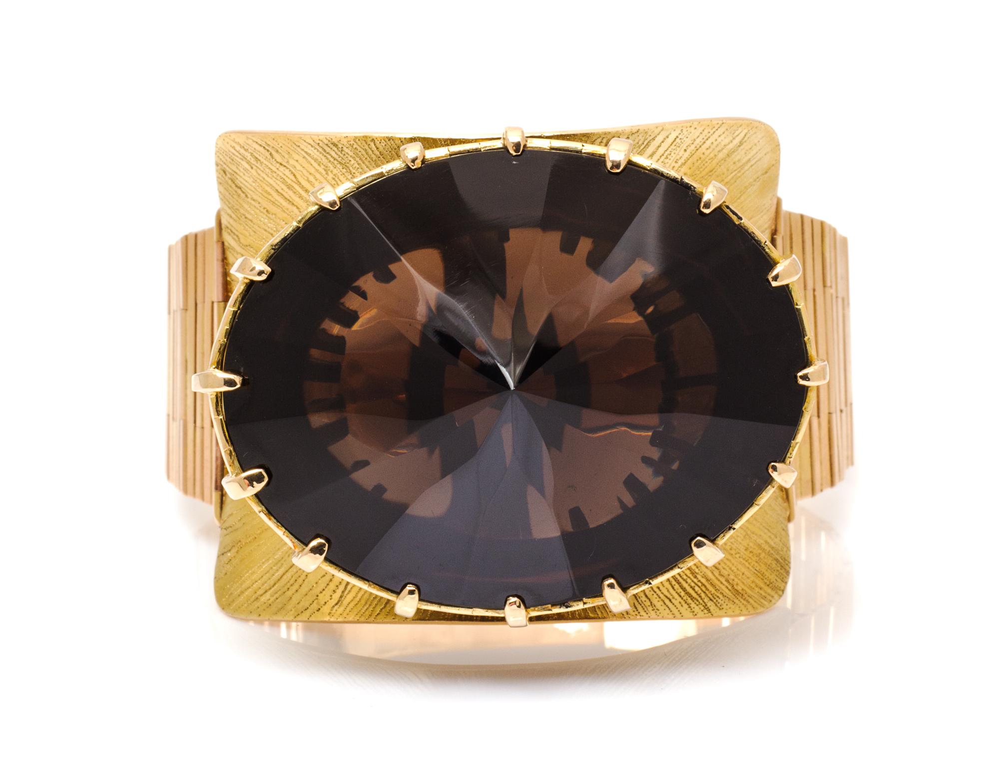 A Yellow Gold and Smokey Quartz Bracelet, Heikki Seppa, 105.70 dwts.